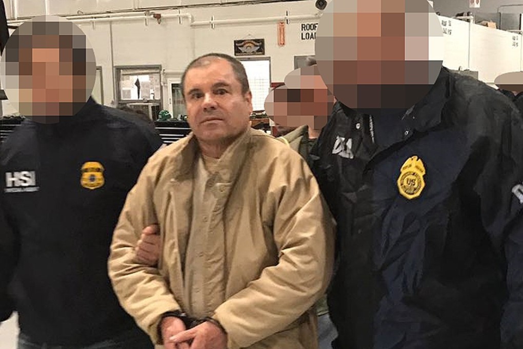 Joaquin ‘El Chapo’ Guzman is escorted by Mexican police as he is extradited to the United States. File photo: AFP