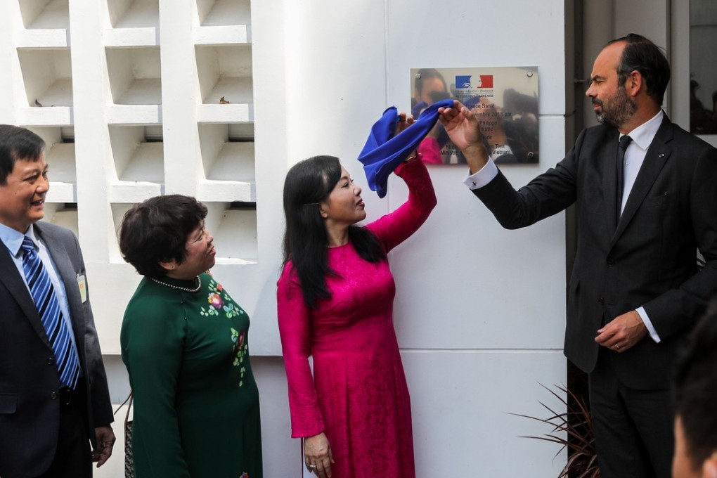 French Prime Minister Edouard Philippe (right) and Vietnam’s health minister Nguyen Thi Kim Tien. Photo: AFP