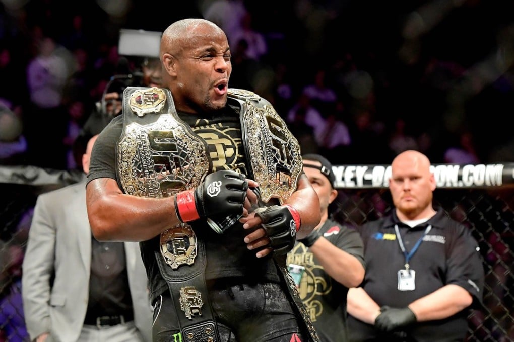 Daniel Cormier celebrates his victory over Derrick Lewis in their heavyweight title bout at UFC 230 at Madison Square Garden, New York. Photo: AFP