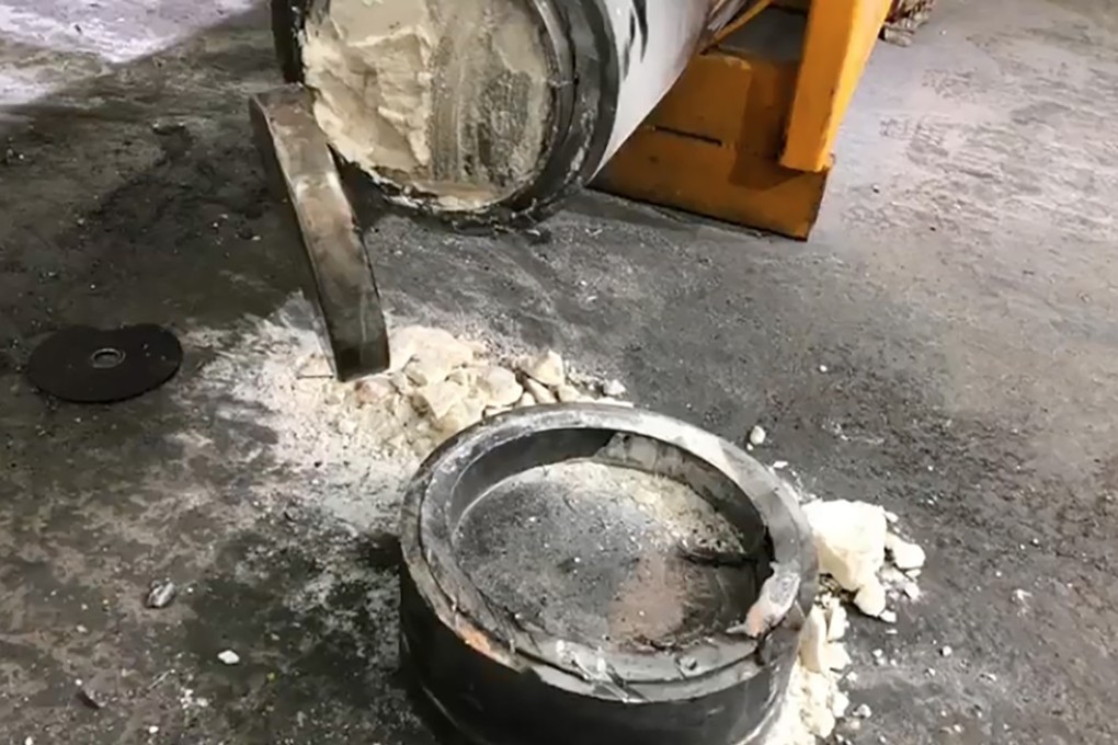 Cracking open the steel cylinders proved a challenge for police. Photo: Handout