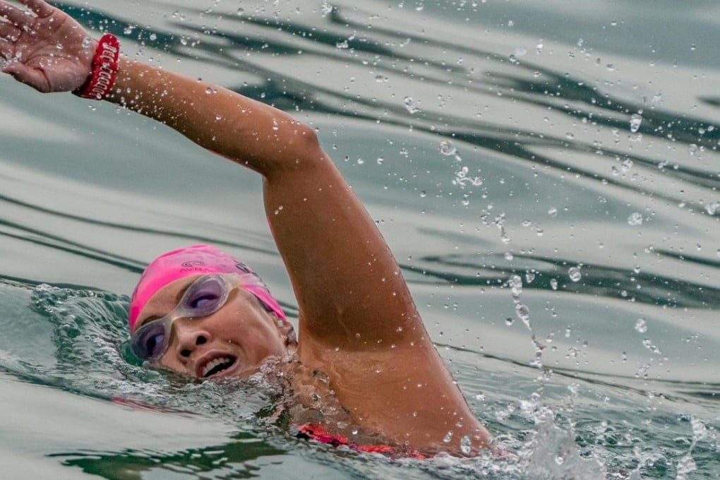 Edie Hu becomes the first woman since Australian Olympian Linda McGill in 1976 to swim around Hong Kong Island, finishing in 12 hours, 37 minutes. Photos: Splash