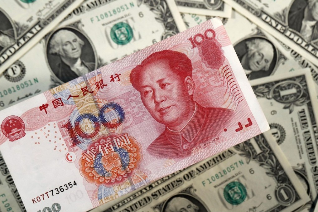 Financial markets have watched anxiously as the yuan has neared an exchange rate of 7 against the US dollar. Photo: Kyodo