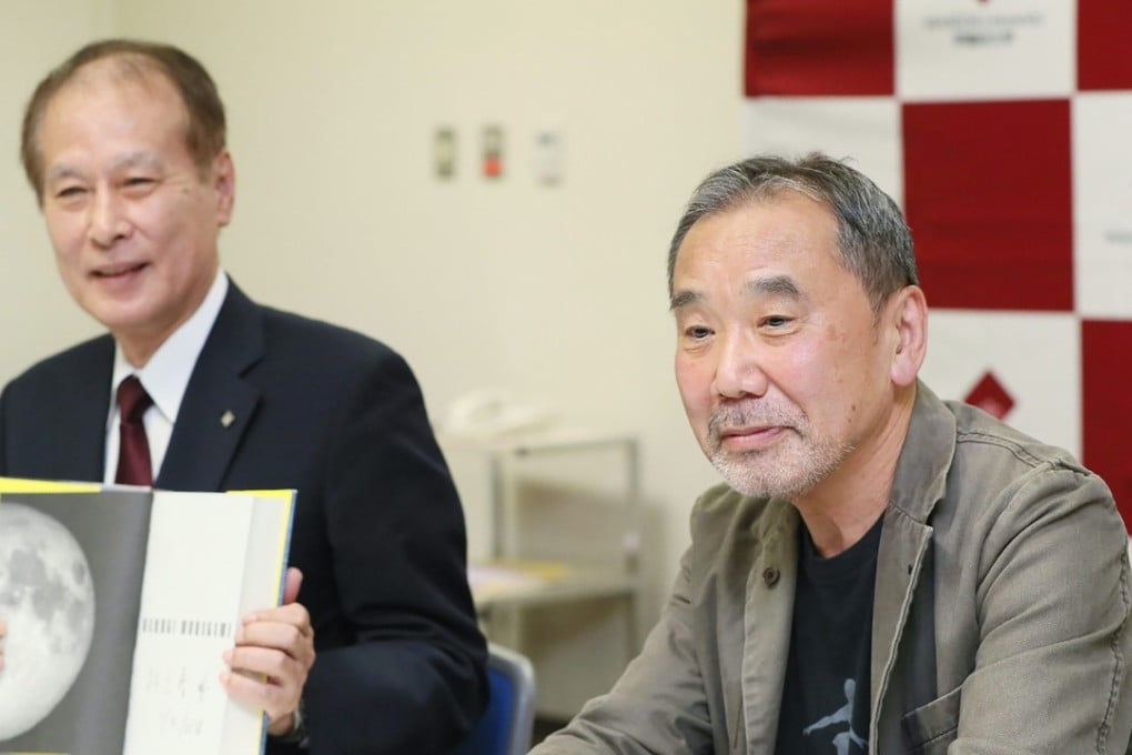 Japanese writer Haruki Murakami attends a book signing at Waseda University in Tokyo. Photo: AFP