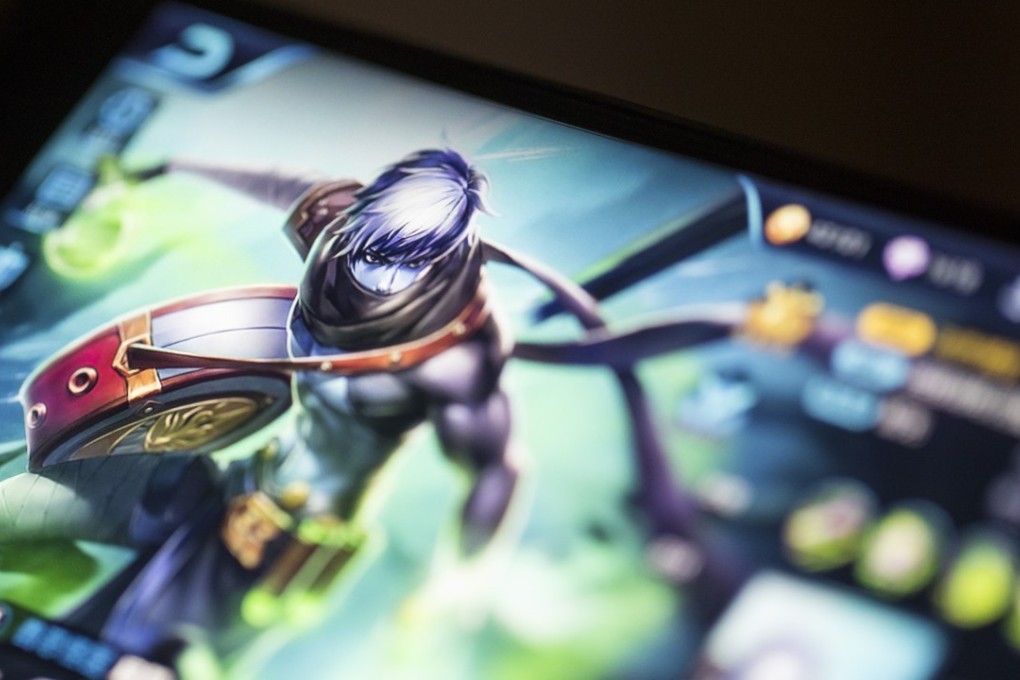 An avatar is displayed in an arranged photograph of the Honour of Kings mobile game, developed by Tencent Holdings Ltd., in Hong Kong, China, on Friday, August 18, 2017. The mobile smash, where professional doppelgängers get paid to help newbies climb both social and gaming ladders, is expected to generate as much as $3 billion in revenue this year. Photographer: Justin Chin/Bloomberg