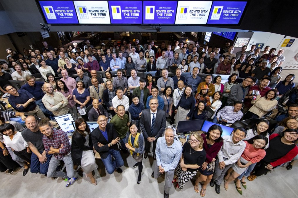 Editor-in-Chief Tammy Tam (centre) with members of the 24/7 newsgathering team at the South China Morning Post’s headquarters in Times Square, Causeway Bay. Photo: Dickson Lee