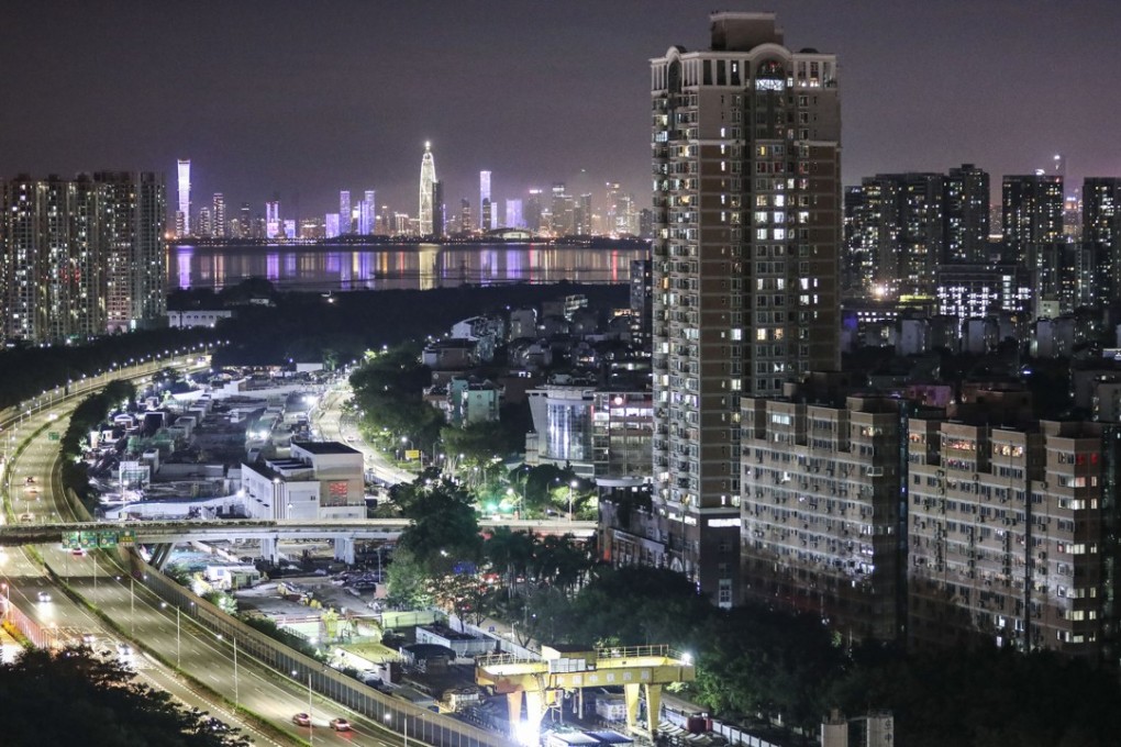 The Beijing-Hong Kong-Macau motorway passes by residential buildings in the Futian district of Shenzhen, which is among the nine mainland cities included in China’s ‘Greater Bay Area’ project. Photo: Roy Issa