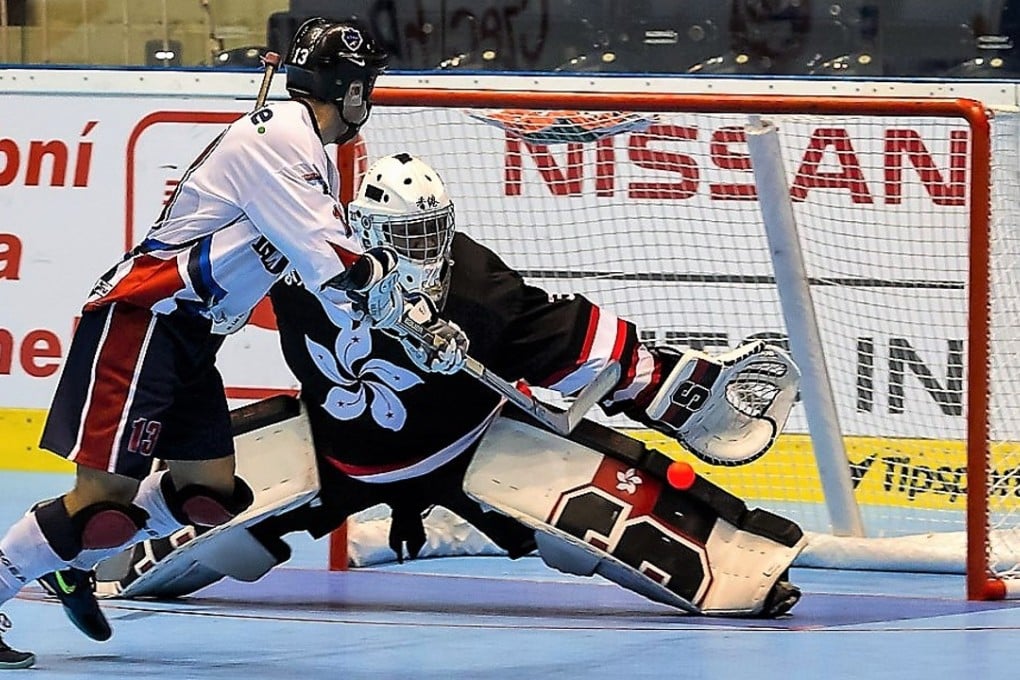Matthew Lui makes a save against the Cayman Islands during the 2017 World Championships B tournament. Photos: Handout