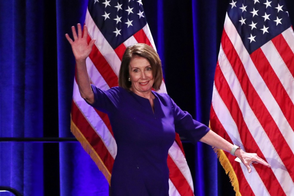 US House Minority Leader Nancy Pelosi arrives onstage to celebrate the Democratic House wins at a Democratic celebration of the results. Photo: Reuters