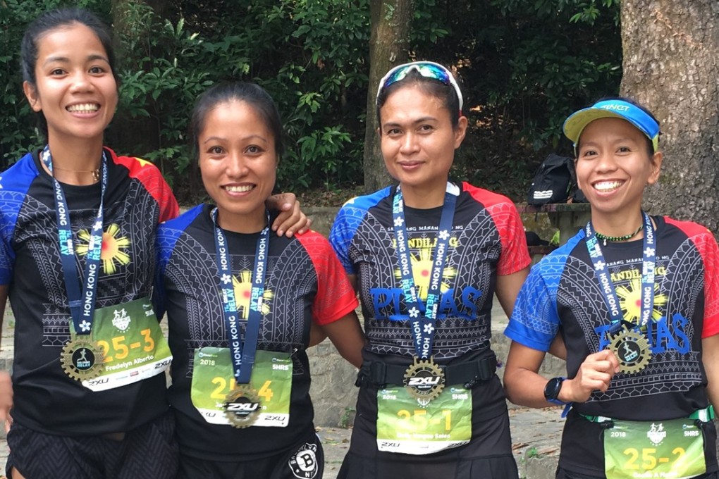 Fredelyn Alberto, Jaybie Pagarigan, Dolly Vargos Sales and Cecile A Flores after winning The Great Relay women’s race. Photos: Ben Young