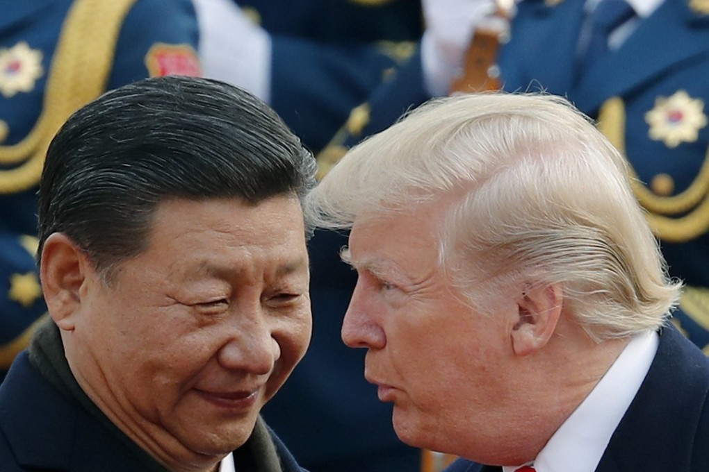 US President Donald Trump, right, chats with Chinese President Xi Jinping during a welcome ceremony in November 2017 at the Great Hall of the People in Beijing. Photo: AP