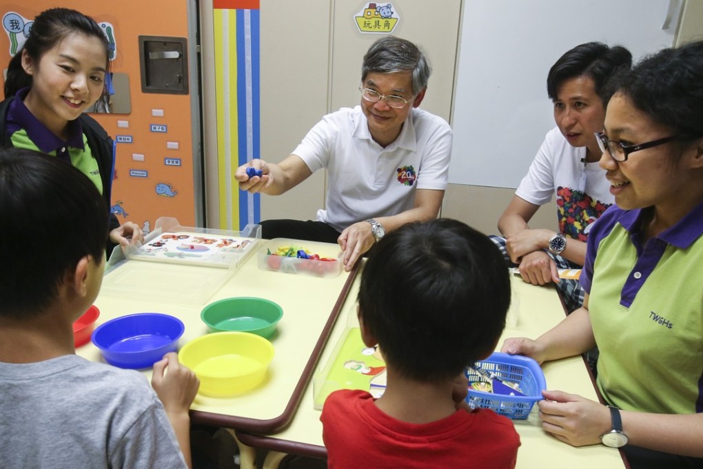 Law Chi-kwong, Hong Kong’s Labour and Welfare secretary,﻿ visits a childcare centre in Tin Shui Wai in July 2017. Photo: David Wong