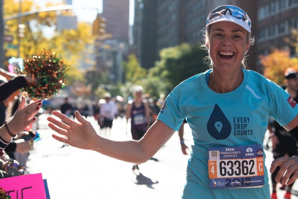 Mina Guli running the New York Marathon, her first of 100 consecutive marathons. Photos: Thirst