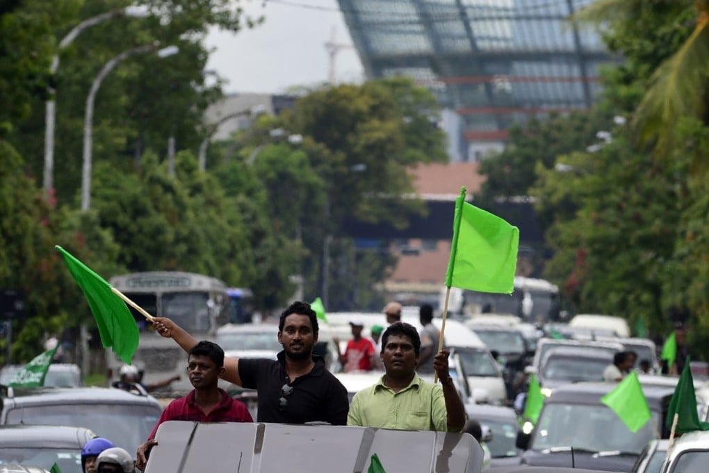 Loyalists of deposed prime minister Ranil Wickremesinghe stage a rally in Colombo. Photo: AFP