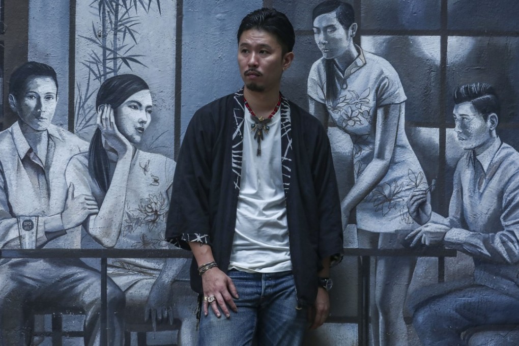 Chef Sato Shun in Elgin Street, Central, wearing denim by Double RL, a kimono by Visvim, and a T-shirt designed by Fukuro. Photo: Jonathan Wong
