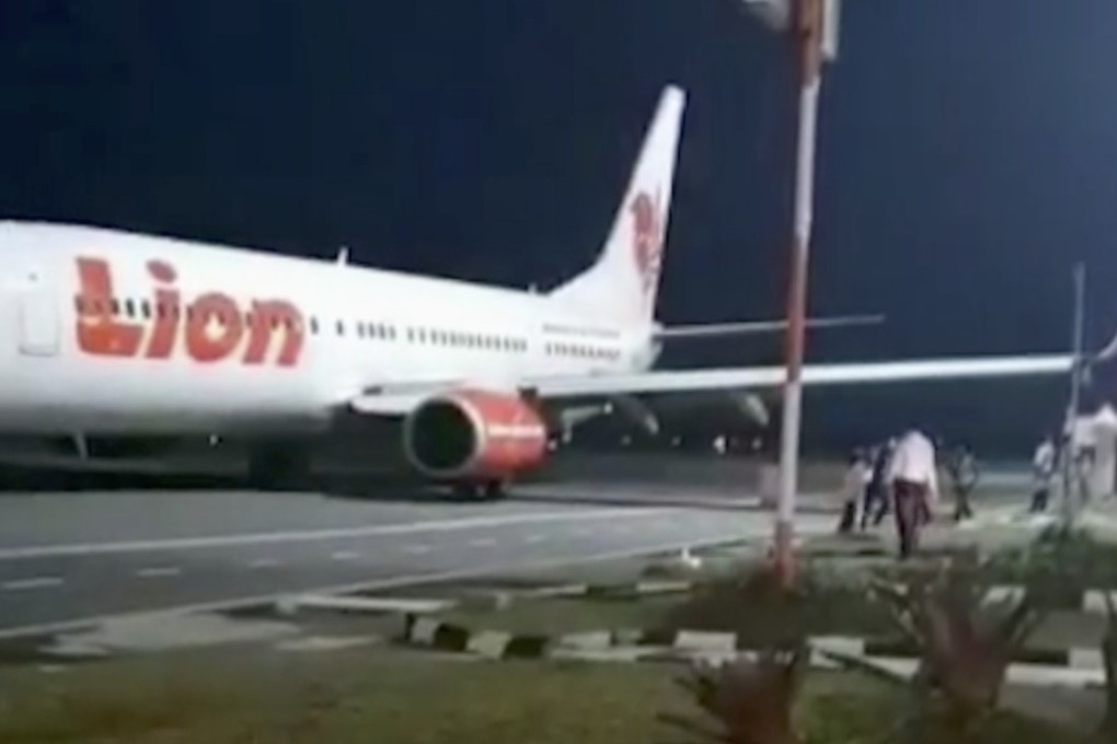 The plane struck a lamp pole before take-off on Wednesday night in Bengkulu, Indonesia. Photo: UGC via AP