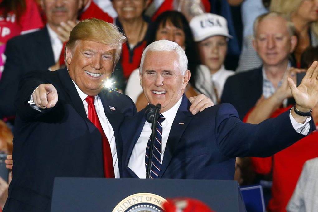 President Donald Trump and Vice President Mike Pence wave to supporters at a rally in Florida. Pence will head off on a week-long tour of Asia promoting Trump’s new strategy for the region. Photo: AP