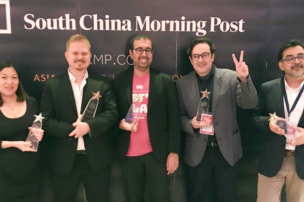 Shortlisted winners from South China Morning Post (Left to right): Juliana Liu (Best digital news start-up); Mat Booth (Best use of online video); Ravi Hiranand (Best digital news start-up); Adolfo Arranz (Best data visualisation); and Marcelo Duhalde (Best data visualisation) at the event in The Mira Hong Kong, Tsim Sha Tsui. Photo: SCMP