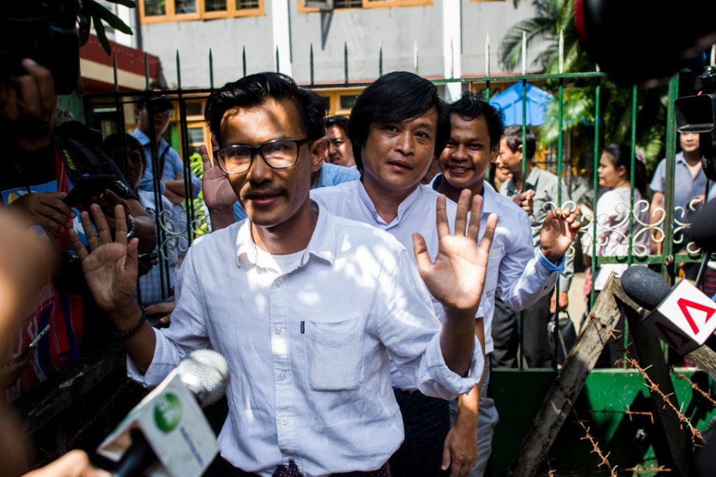 Myanmar journalists Kyaw Zaw Lin, Nayi Min and Phyo Wai Win leave court after an earlier hearing in Yangon. Photo: AFP