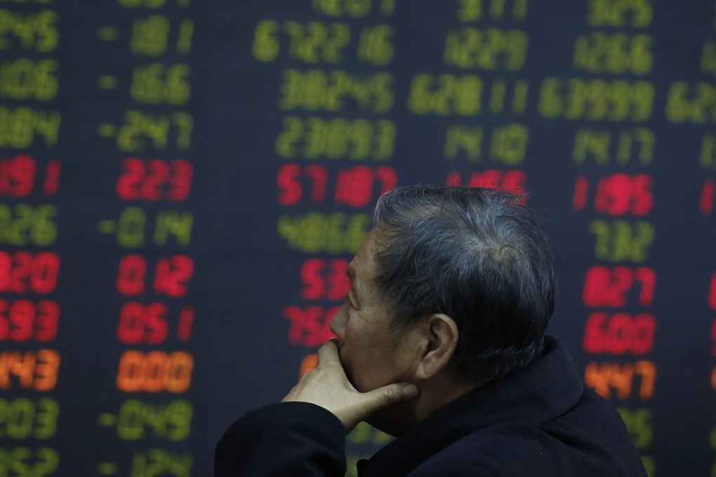 An investor monitors stock prices at a brokerage house in Beijing on October 24, 2018. Photo: AP