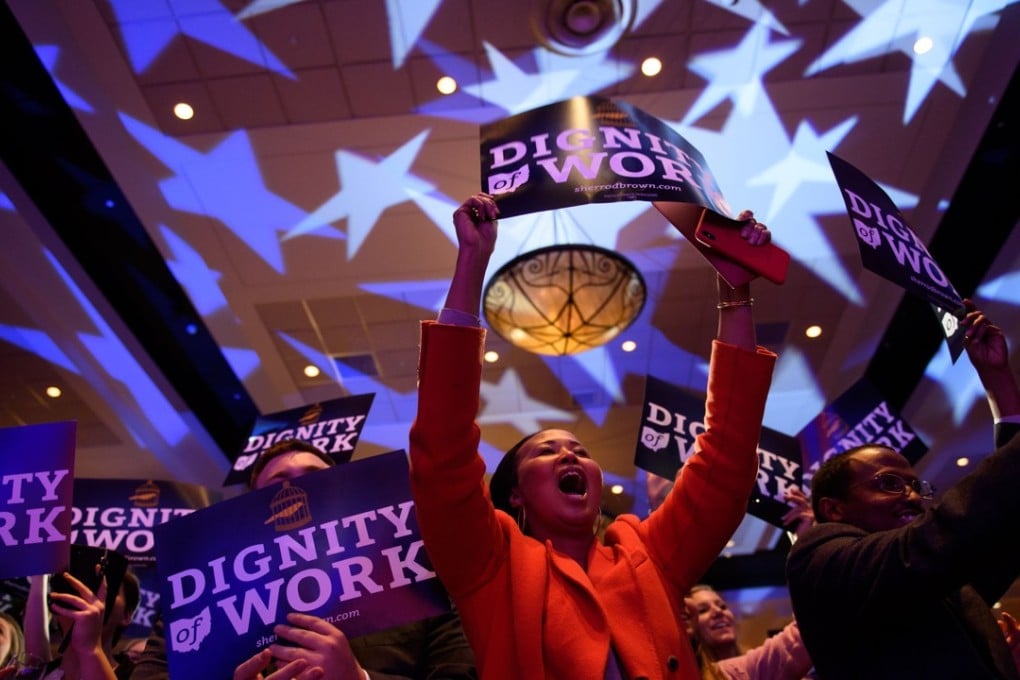 Supporters of US Senator Sherrod Brown celebrate his campaign victory on November 6, 2018 in Columbus, Ohio. Democrats claimed a slim majority in the House of Representatives, but Republicans retained their control of the Senate. Photo: AFP