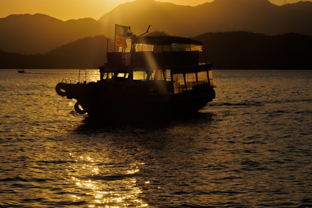 A Sharp Island kaito boat is seen at sunset on January 13. Photo: Martin Williams