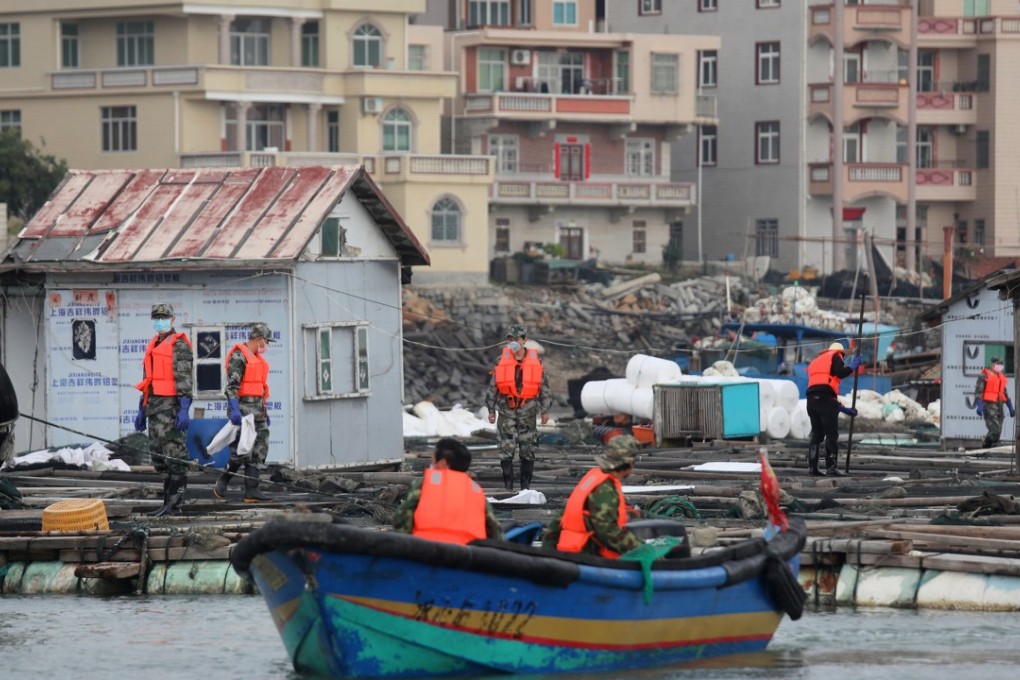 Xiaocuo villagers conduct a clean-up operation. Photo: Xiaomei Chen