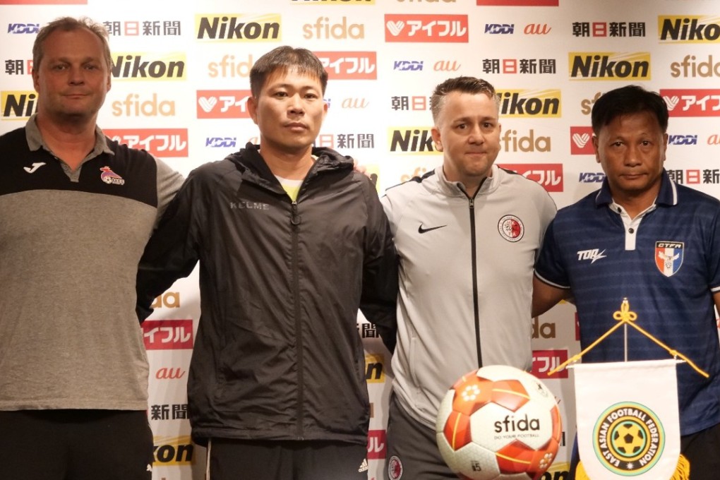 Hong Kong coach Gary White (second from right) poses with the Mongolia, North Korea and Taiwan coaches in a press conference in Taiwan. Photos: HKFA
