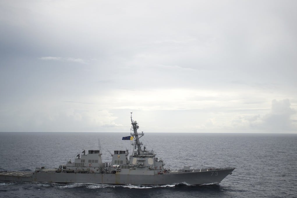 FILE - In this Oct. 13, 2016, file photo provided by the U.S. Navy, guided-missile destroyer USS Decatur (DDG 73) operates in the South China Sea as part of the Bonhomme Richard Expeditionary Strike Group (ESG). China’s ambassador to the United States has defended the Chinese navy’s action in a close encounter with the U.S. destroyer in the South China Sea, saying America’s warships are “on the offensive” near Chinese territory. (Petty Officer 2nd Class Diana Quinlan/U.S. Navy via AP, File)
