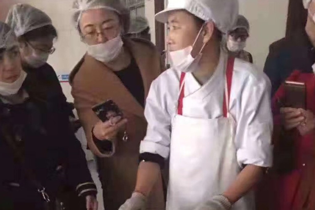 Parents visiting a school kitchen in east China were horrified to find a bowl filled with black cooking oil. Photo: Weibo