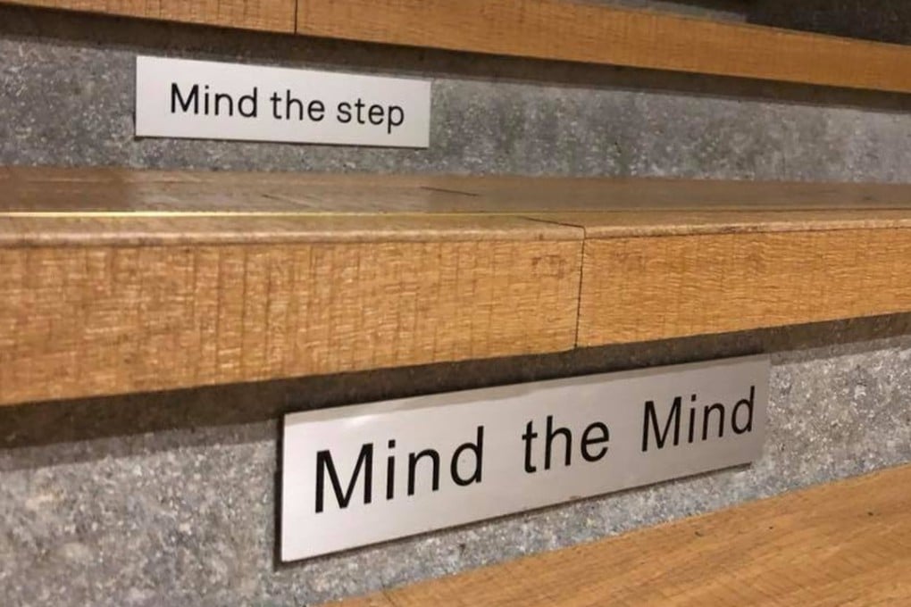 Signs saying ‘Mind the Mind’ were found on a staircase in an exhibition area in Tai Kwun. Photo: Jaffe.T