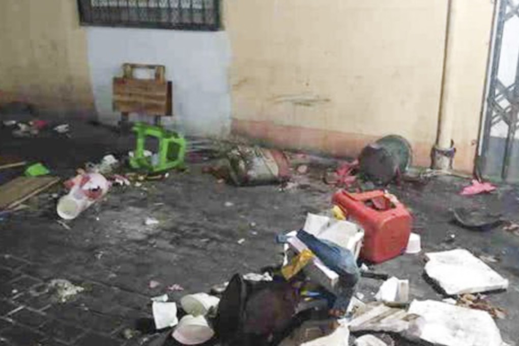 Wreckage at the scene, where a car ploughed into a group of people at a roadside snack stall. Photo: kaixian.tv