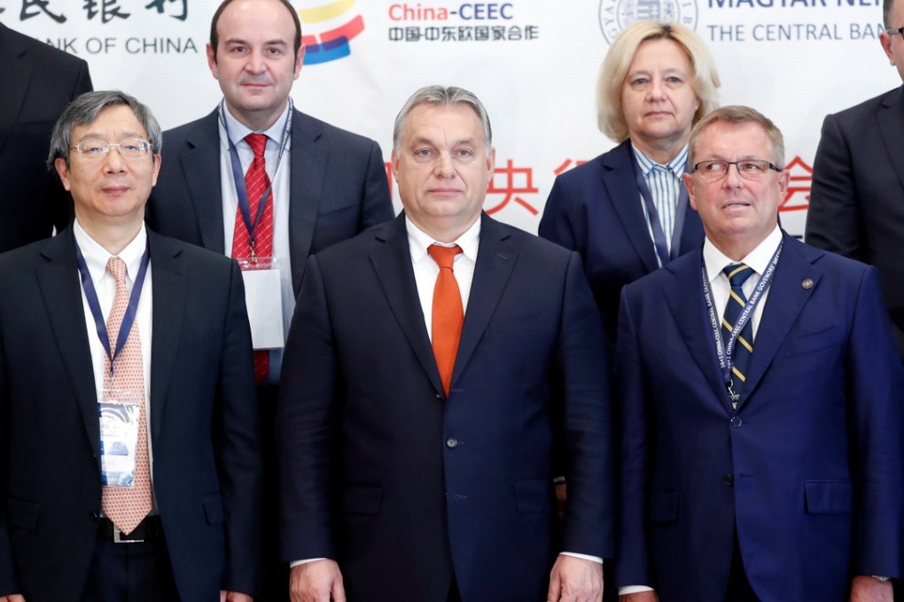 China’s Yi Gang (left) attended the inaugural 16+1 China-CEEC Central Bank Governors’ Meeting in Budapest on Friday. Photo: Reuters