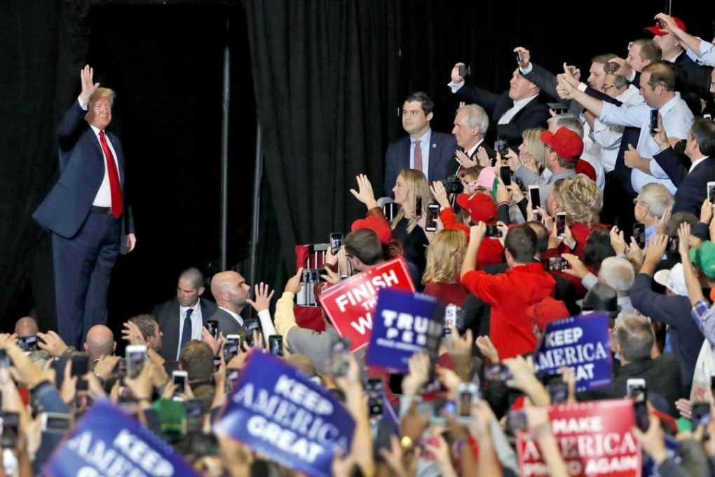 President Donald Trump waves to supporters after being introduced during a campaign rally on November 5 in Cape Girardeau, Missouri. Photo: AP