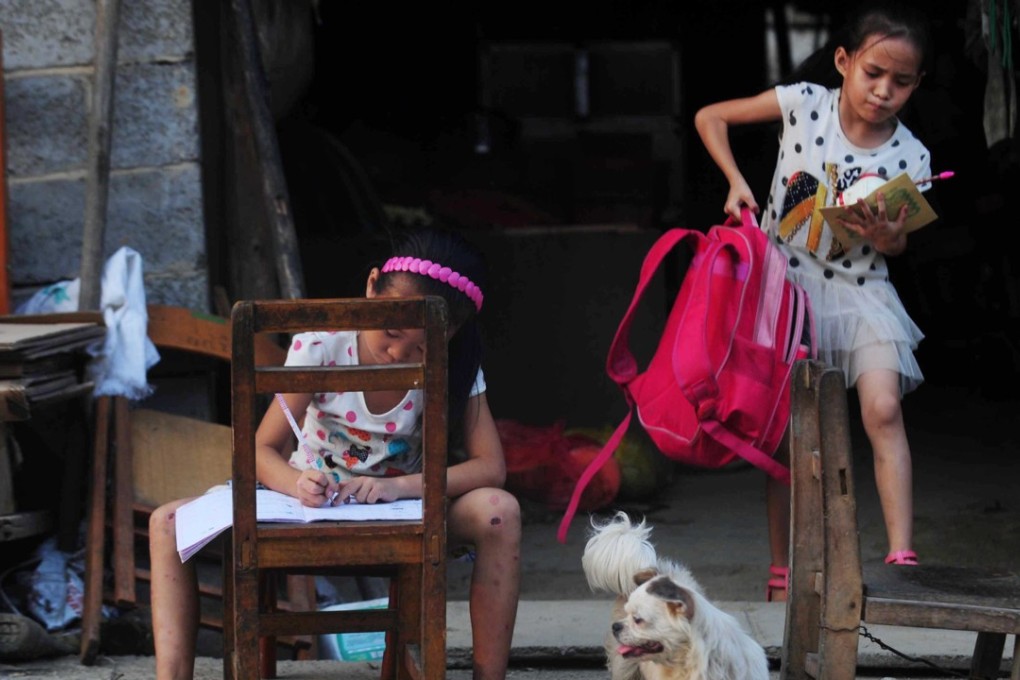 Chinese parents are complaining that they are losing sleep over their children’s homework. Photo: Xinhua