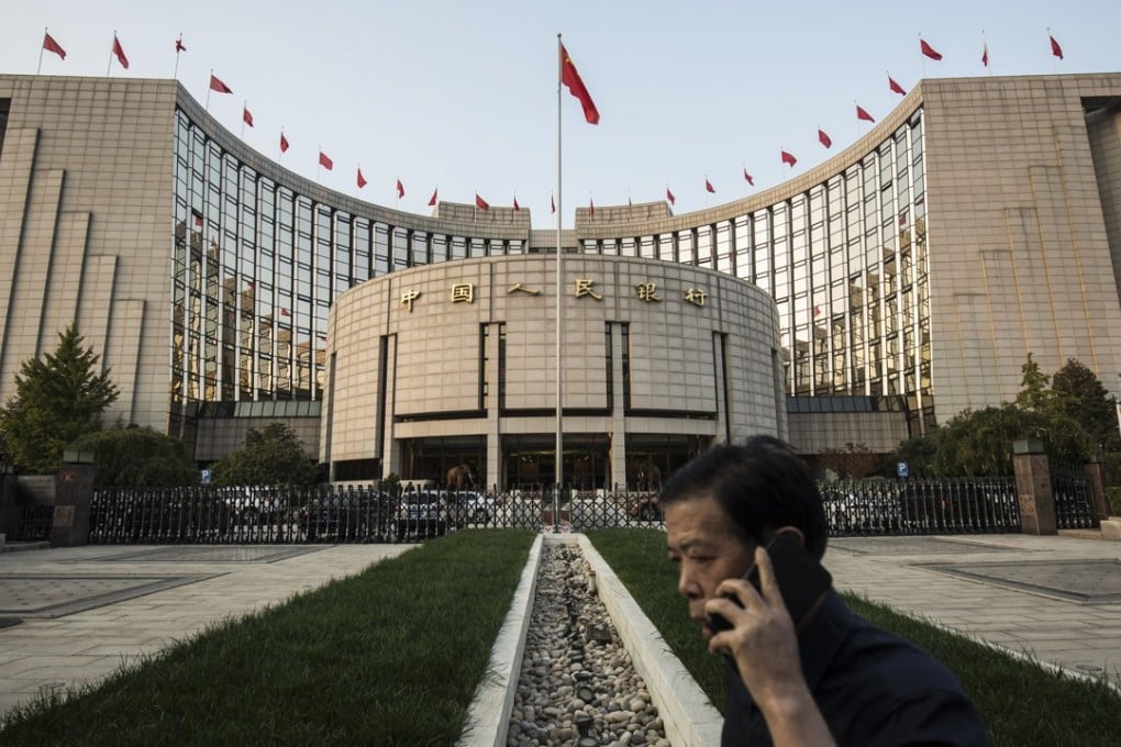 In a report published on Friday, the People’s Bank of China pledged to ‘reinforce macro-prudential management to keep the yuan exchange rate at reasonable and equilibrium level, if necessary’. Photo: Bloomberg