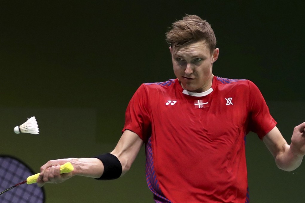 Viktor Axelsen of Denmark plays a shot against Huang Yuxiang of China at the 2018 BWF World Championships in Nanjing. Photo: AP