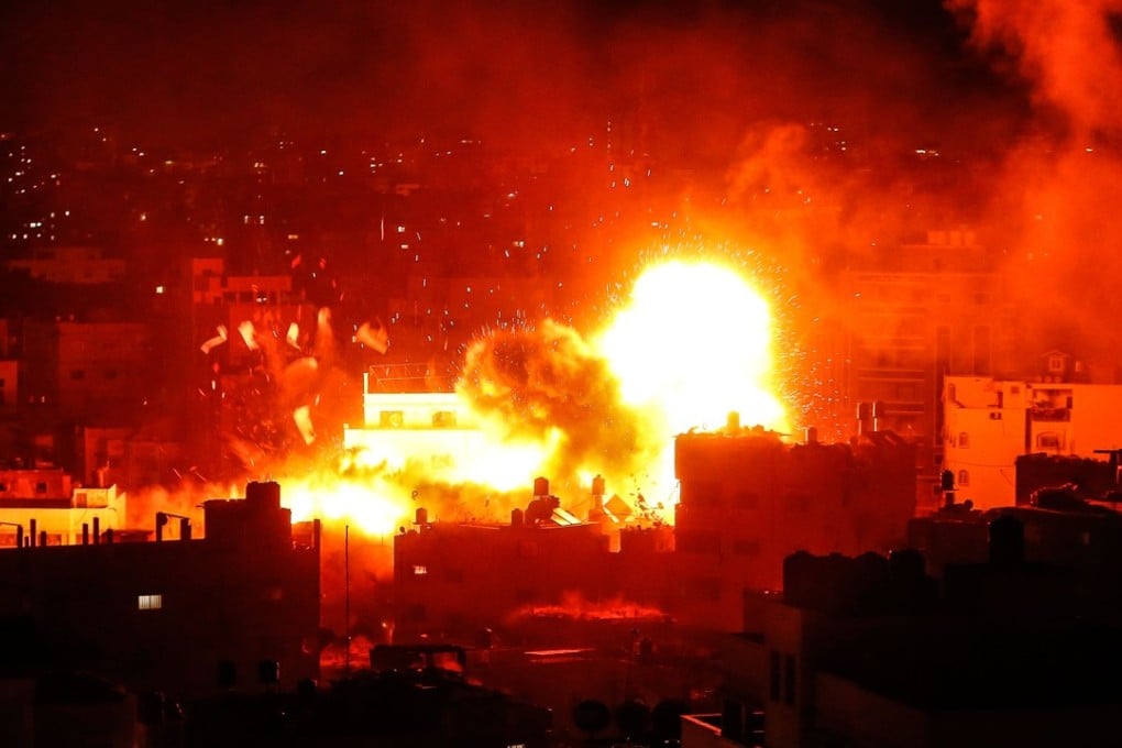 The building housing the Hamas-run television station al-Aqsa TV in the Gaza Strip is hit by an Israeli air strike on Monday. Photo: AFP