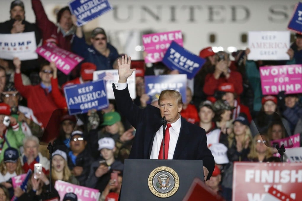 US President Donald Trump speaks at a rally on October 24 in Mosinee, Wisconsin. Trump stepped up the anti-immigration rhetoric while campaigning for the US midterm elections. Photo: AP
