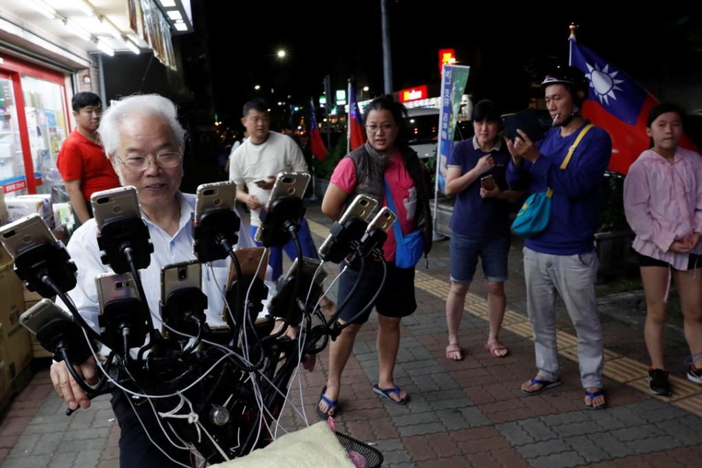 Chen San-yuan on the hunt for Pokemon.Photo: Reuters