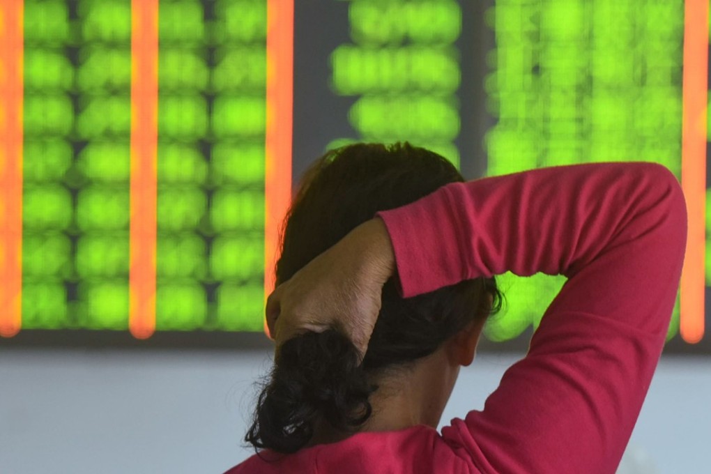An investor at a securities company in Hangzhou in China’s eastern Zhejiang province. China’s stock market has lost about 50 per cent of its value since a peak in the summer of 2015. Photo: AFP