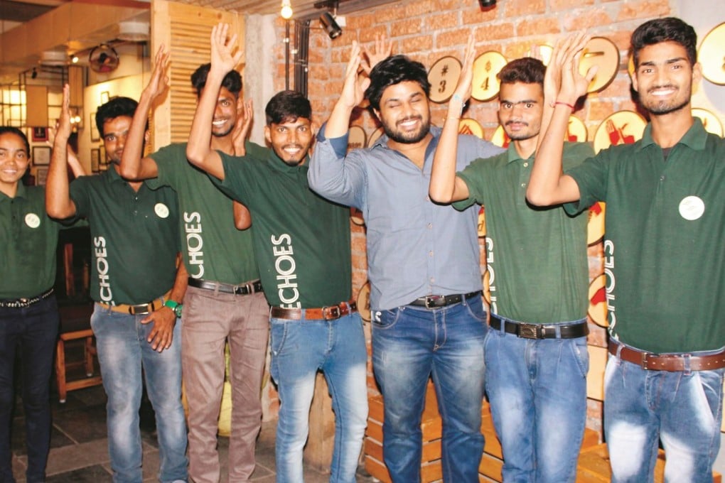 Hearing-impaired staff at Echoes Koramangala restaurant in Bangalore, India.