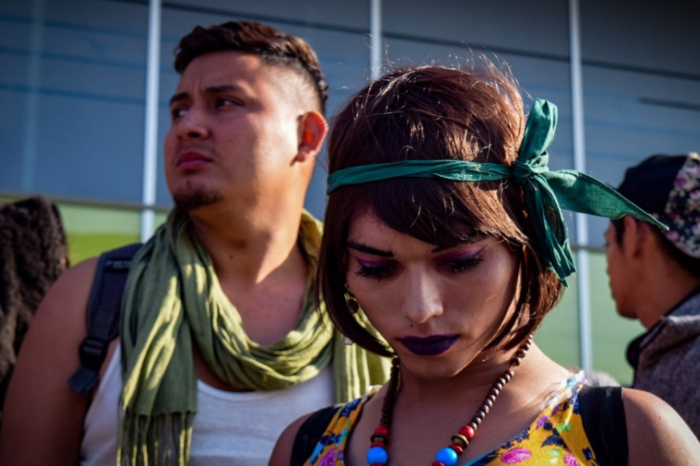 Members of the LGBT community, who separated from the larger caravan of Central American migrants travelling through Mexico, arrive on Monday at the border city of Tijuana, from where they will ask for asylum in the United States. Photo: EPA