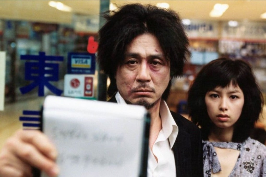 Choi Min-sik (left) and Kang Hye-jeong in Oldboy.