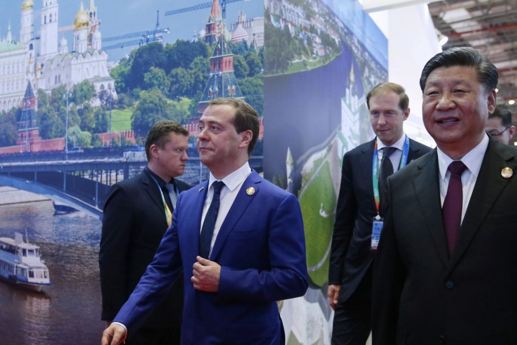 Chinese President Xi Jinping (left) at the opening of the first China International Import Expo, in Shanghai. Picture: Alamy