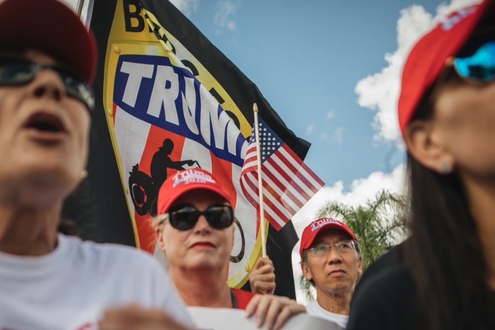 Supporters of US President Donald Trump protest outside the Broward County Supervisor of Elections office in Lauderhill, Florida, on Monday18. Florida's Senate and governor's races have gone to a recount that will decide two key offices in the largest US swing state, setting off outcries from Republicans led by Trump and Rick Scott, the state's governor now vying to be a US Senator. Photo: Bloomberg
