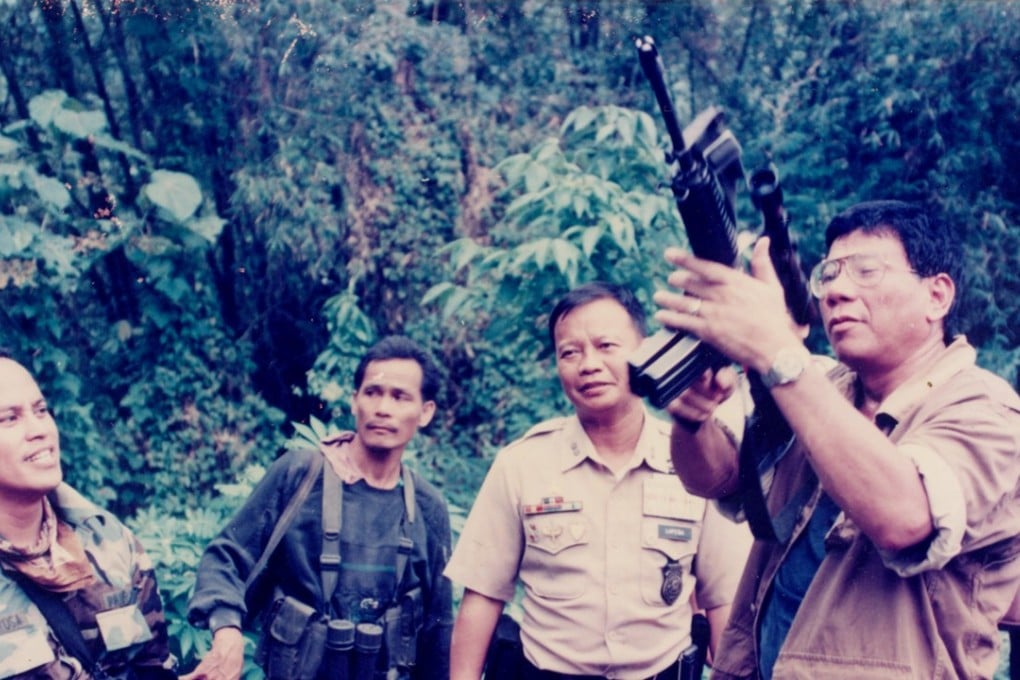 Rodrigo Duterte, right, with Isidro Lapena, second from right, in 1997. Duterte recently reassigned Lapena from his role of customs chief after he allowed a drug shipment valued at 11 billion pesos (US$331 million) to slip into Manila. Photo: Reuters