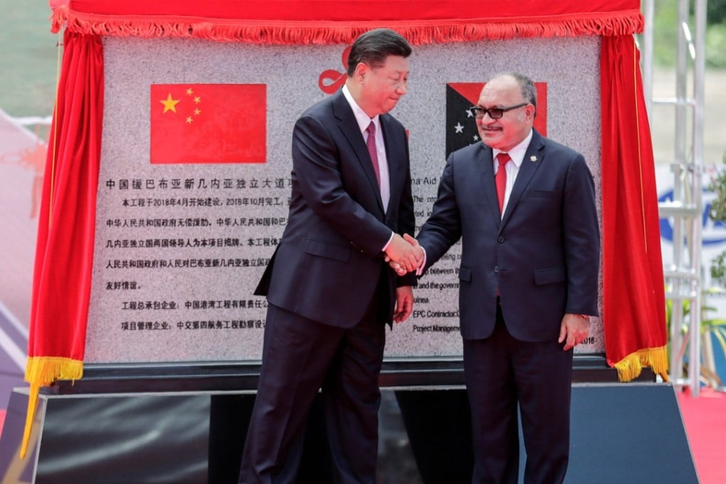 Chinese President Xi Jinping (left) and Papua New Guinean Prime Minister Peter O’Neill agreed to boost ties when they met in Port Moresby on Friday. Photo: Reuters