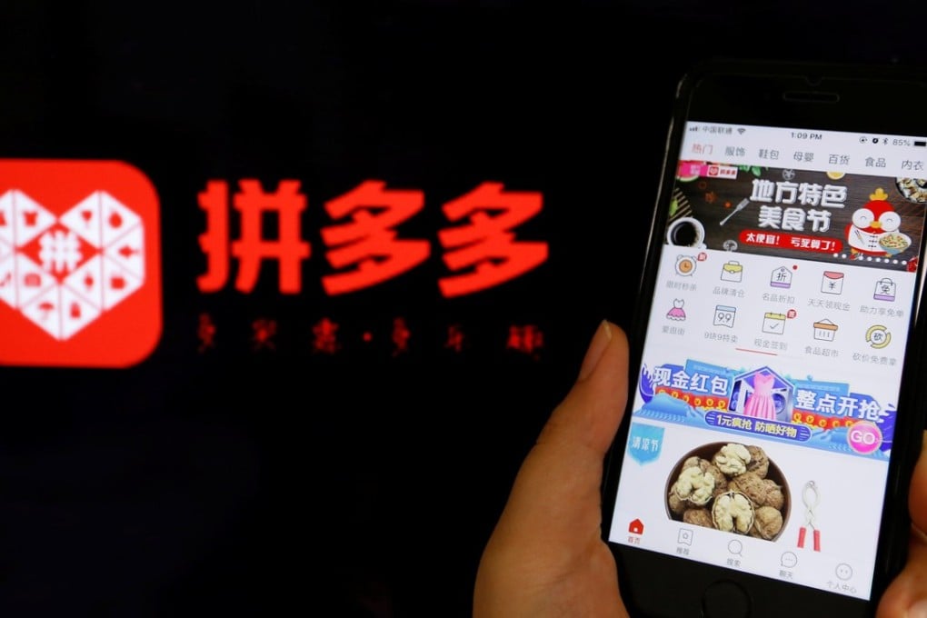 The logo of Chinese online group discounter Pinduoduo next to its mobile phone application. Photo: REUTERS