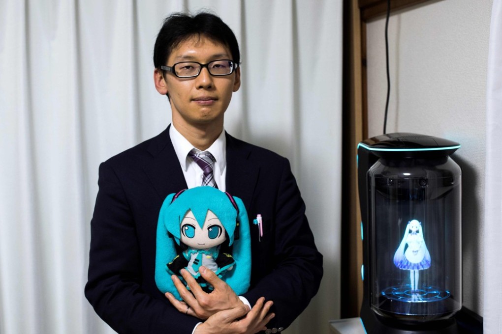 Japanese civil servant weds computer-generated hologram he