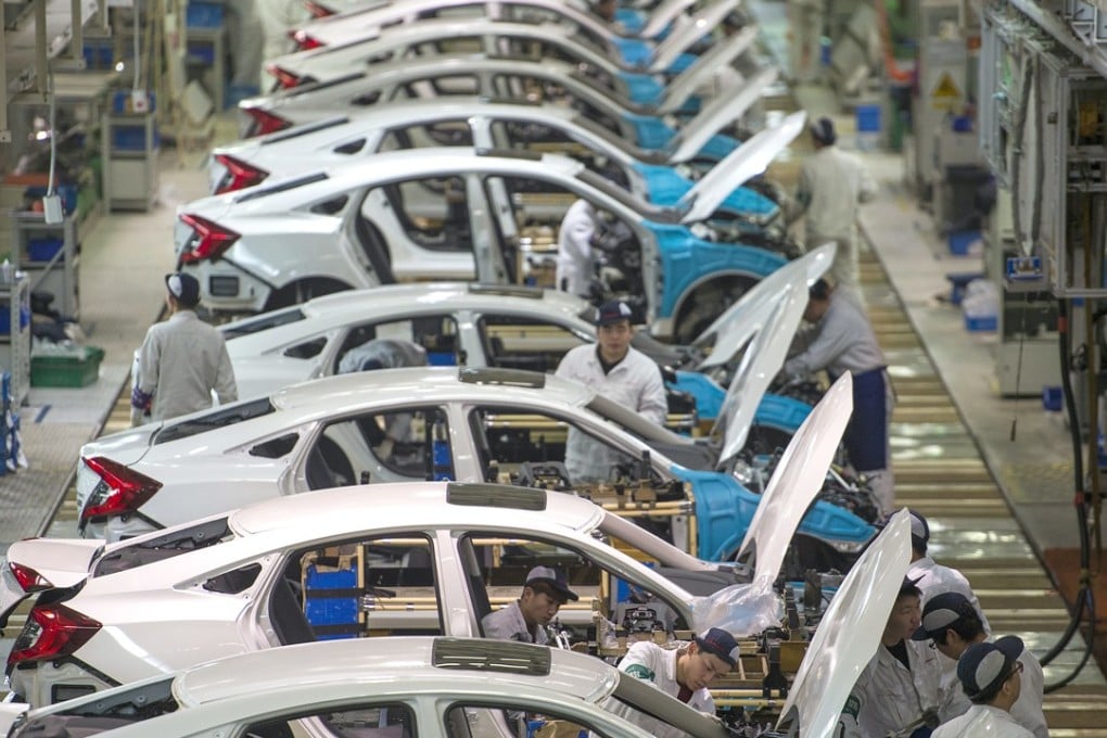 Honda Civics on an assembly line at Dongfeng’s venture with Honda Motor in Hubei’s provincial capital of Wuhan on January 18, 2018. Dongfeng, China’s second-largest carmaker, moved its passenger car assemblies to Wuhan in 2003, leaving its commercial truck plant in Shiyan, where it originated from. Photo: Chinatopix via AP